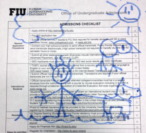 A photo of an MDC student's completed admissions checklist for FIU.